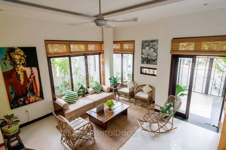 A living room with wicker furniture in Danang, Vietnam.
