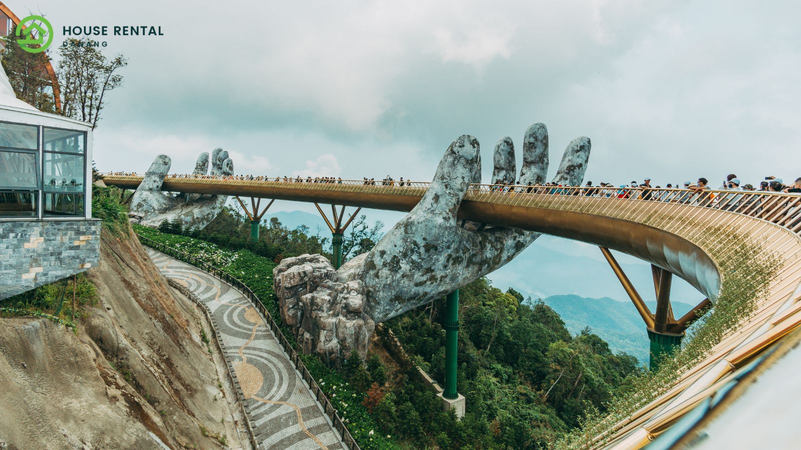A bridge with a giant hand on top of it, connecting Danang and Singapore.