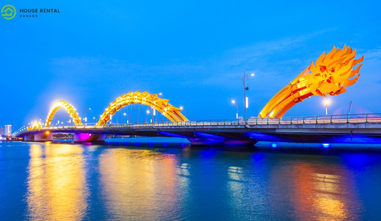 A dragon statue on a bridge in Da Nang, ensuring safety at night.