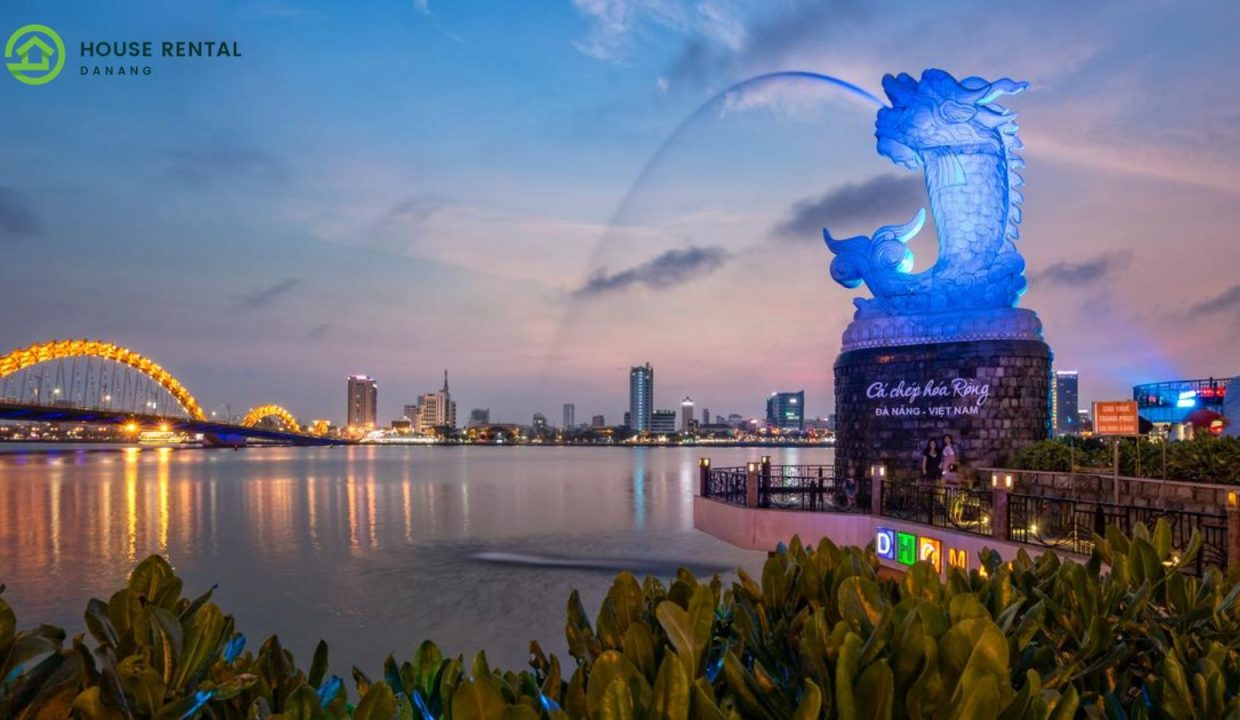 A blue statue of a dragon in front of a city.