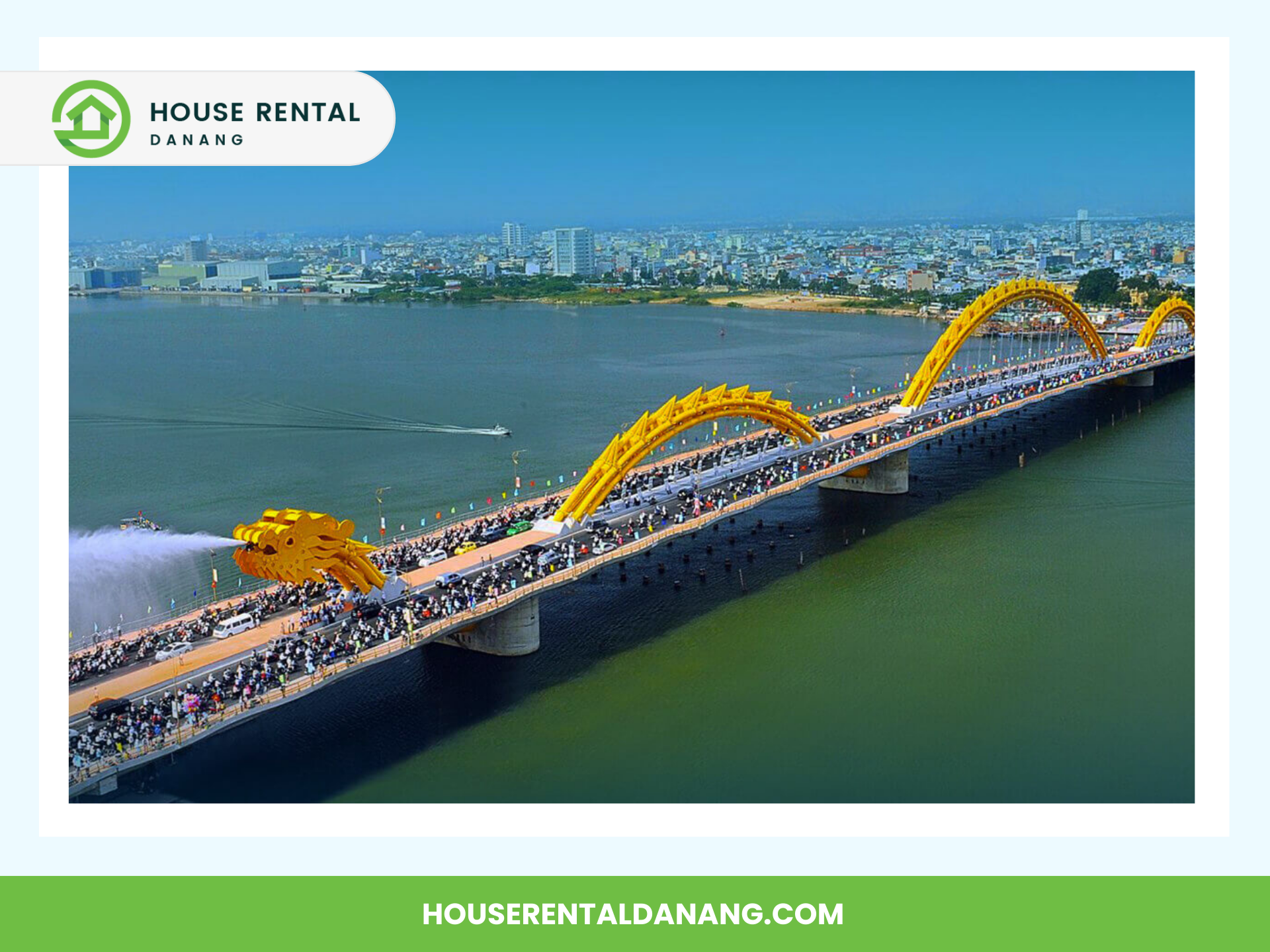 Image of a long bridge with a yellow dragon sculpture spanning across a wide river, crowded with people. In the background is a cityscape. "House Rental Danang" logo and website are visible. This iconic structure is known as Dragon Bridge in Da Nang.