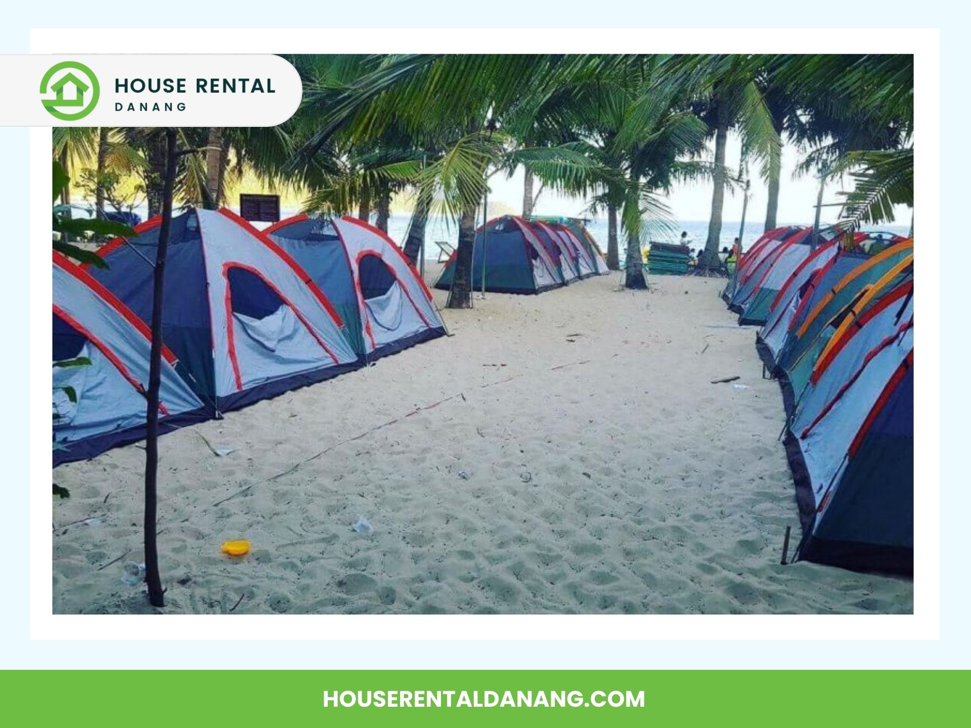 A row of colorful tents set up on a sandy beach surrounded by palm trees, with a glimpse of the sea in the background. House Rental Danang branding is visible on the borders and their logo proudly showcased. Experience one of the many reasons to travel to Cham Island with us!