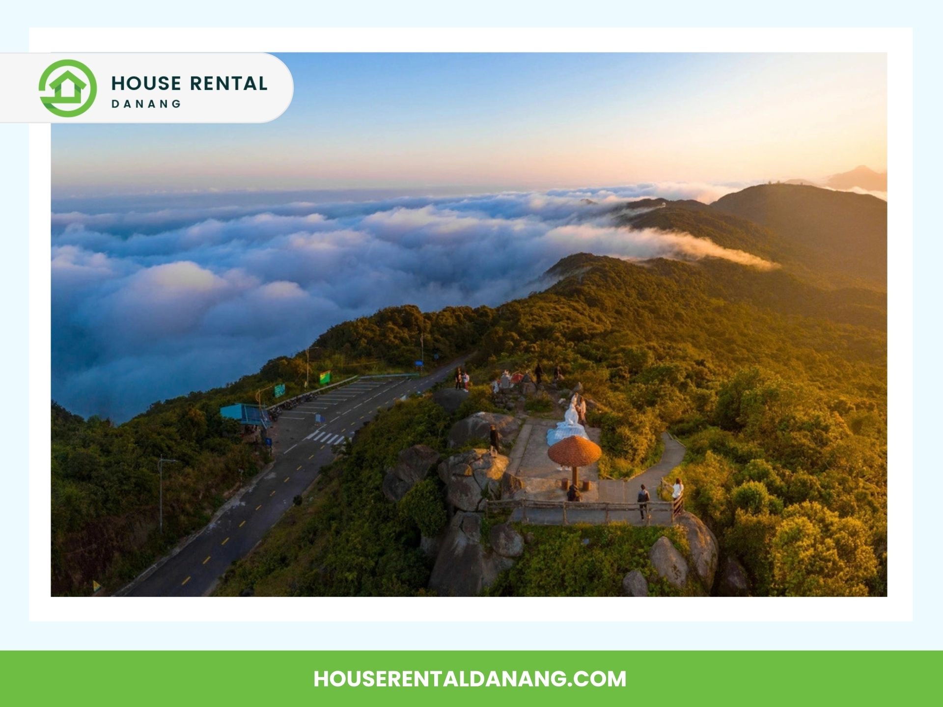 A scenic view showing people on a lookout point at Ban Co Peak, surrounded by lush greenery, with clouds and distant mountains at sunset. A road is visible on the left. Text reads: "House Rental Danang" with a website link.