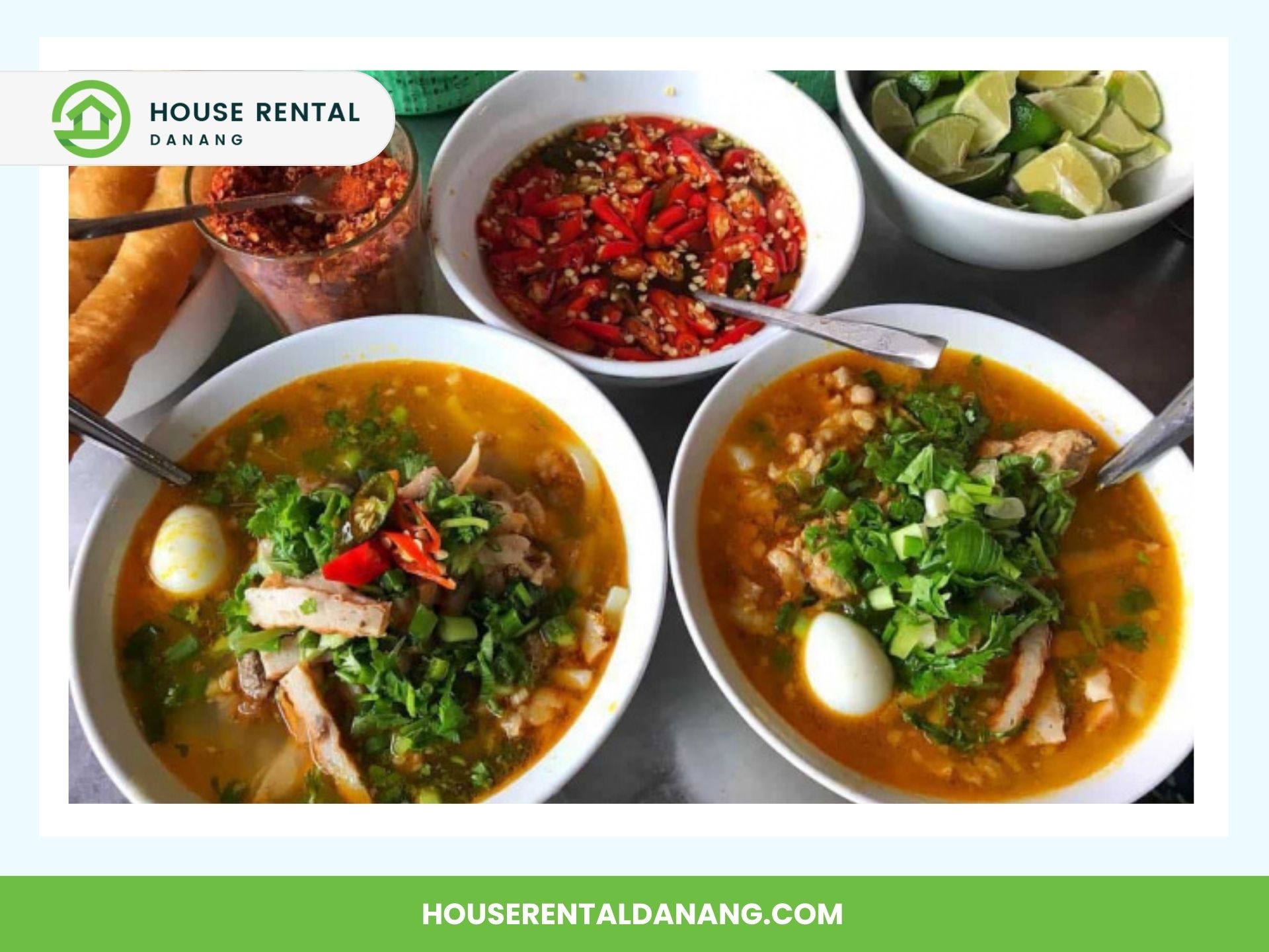 Three bowls of Vietnamese soup garnished with herbs and vegetables, reminiscent of the flavors you'd find at Con Market. Side dishes include a bowl of sliced chilies in sauce, lime wedges, and crispy breadsticks.