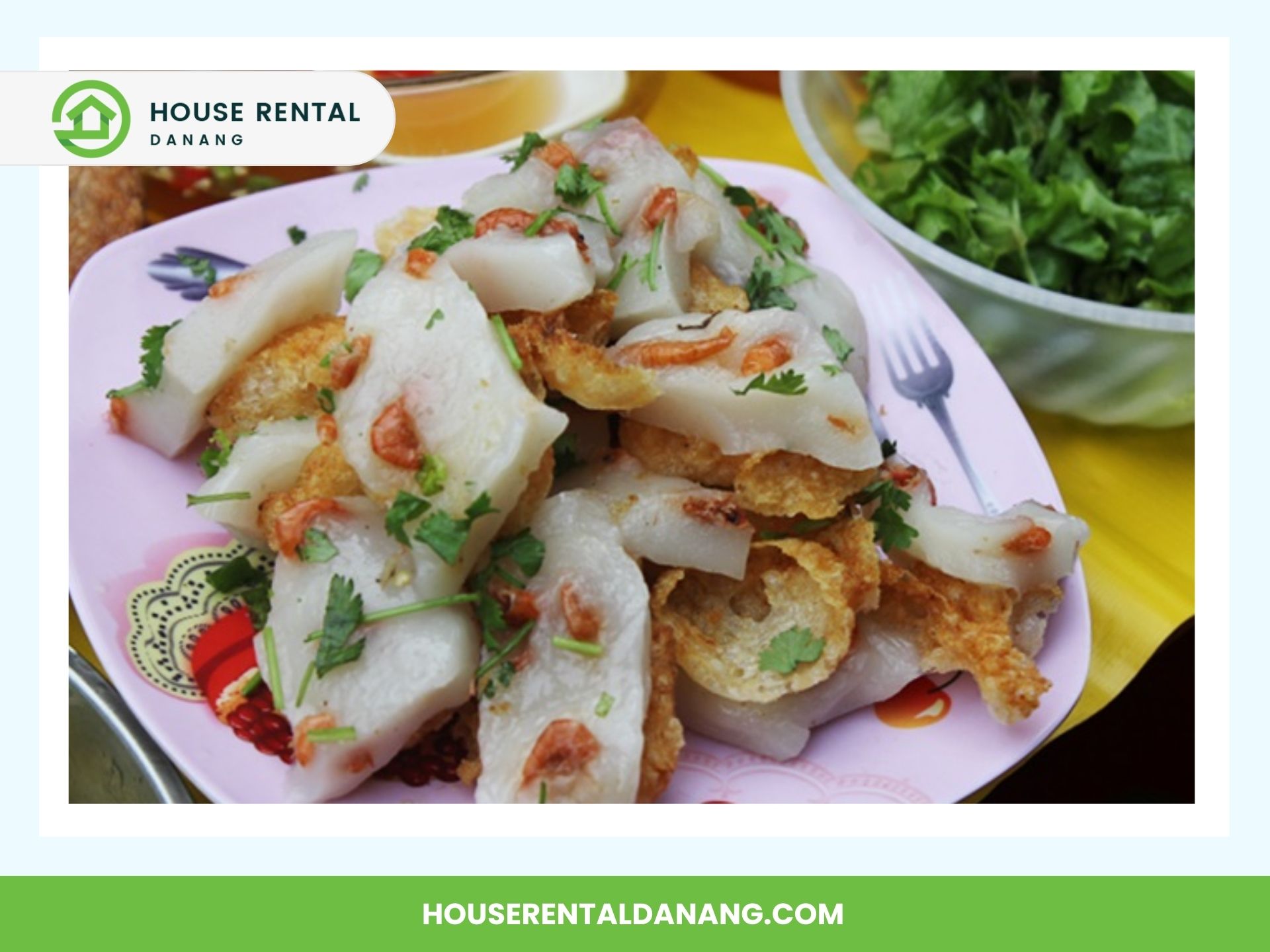 A plate of Vietnamese street food from the bustling Con Market, featuring white blocks garnished with fried shallots, herbs, and a sprig of cilantro. A fork and a bowl of greens are in the background.