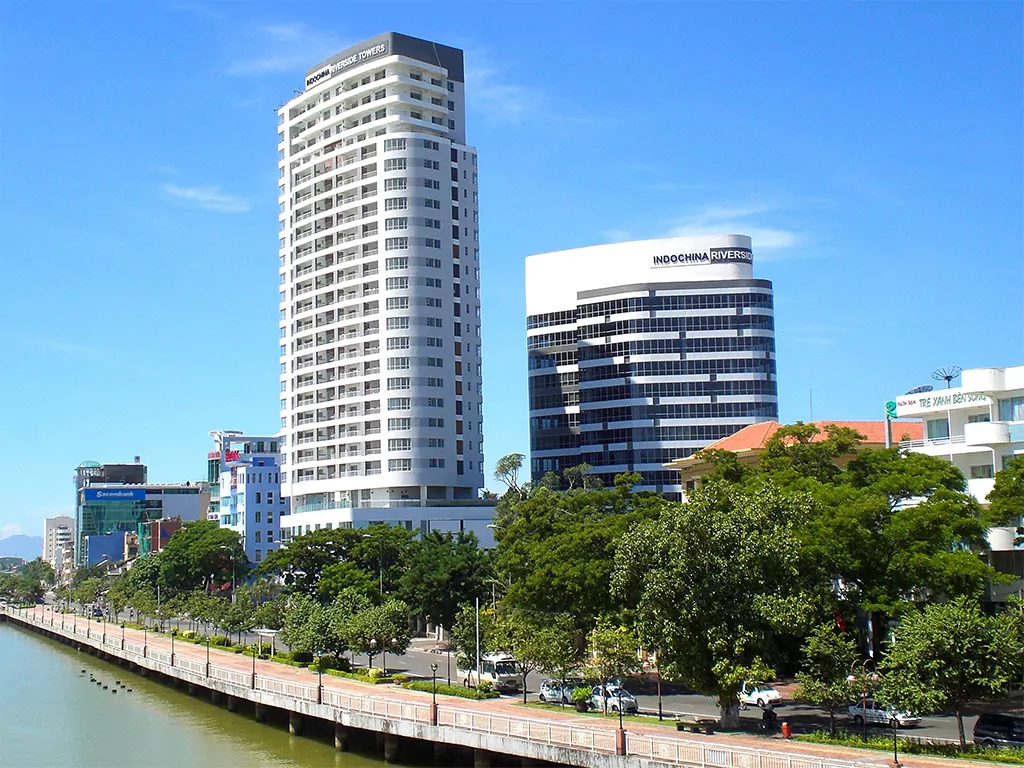 Indochina Riverside Towers exterior beside the river
