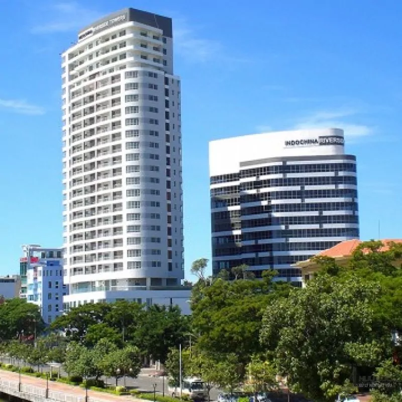 Indochina Riverside Towers exterior and neighboring building